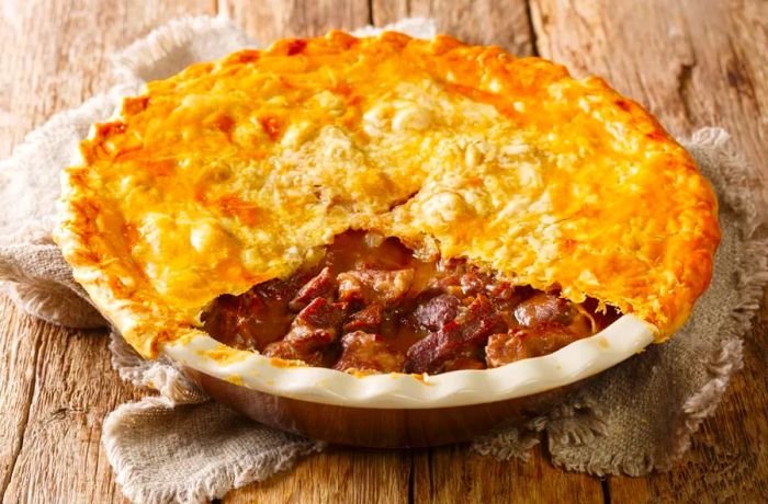 A hearty steak and ale pie is a beloved pub staple.