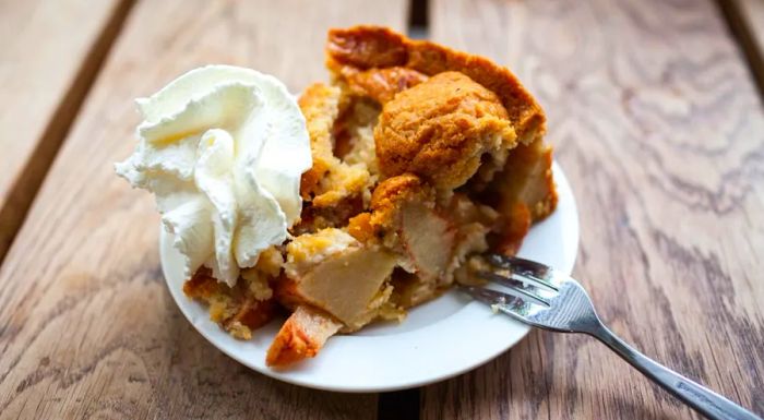 Dutch appelvlaai is a fruit pie traditionally made with yeasted brioche dough rather than a classic butter pastry crust.