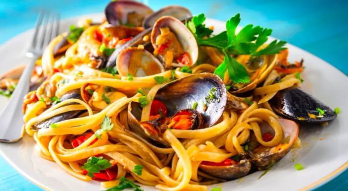 This linguine dish features a bounty of the freshest seafood straight from the ocean.