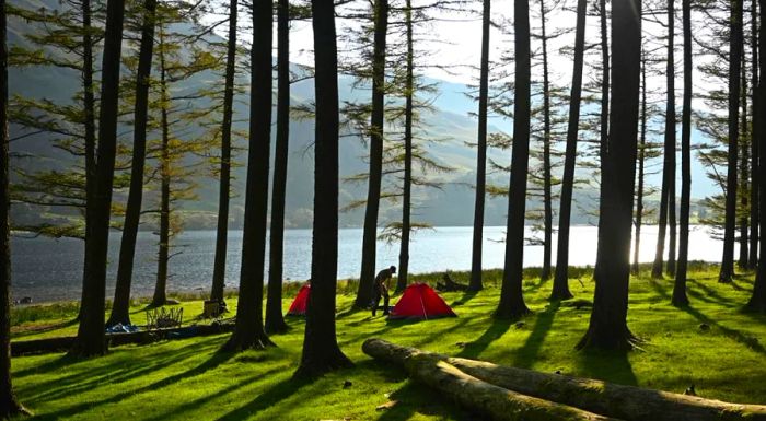 Campers at Buttermere Lake in England's Lake District during August 2020.