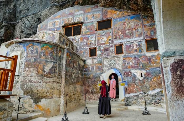 Frescoes that were once defaced with graffiti have been meticulously restored to their original splendor.