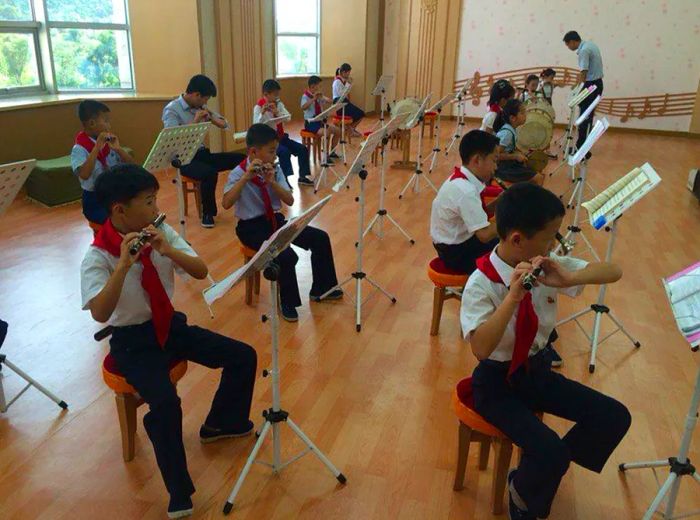 Music lessons, where propaganda songs were translated into Russian, were mandatory at the summer camp.