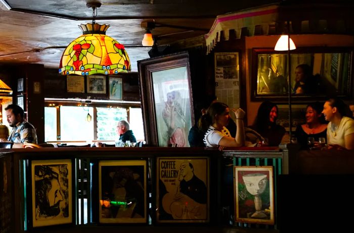 People enjoying drinks at Vesuvio Cafe in San Francisco