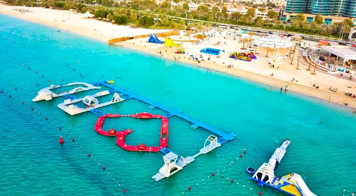 Aquafun Abu Dhabi offers a thrilling inflatable course for all ages, perfect for a day of aquatic fun.