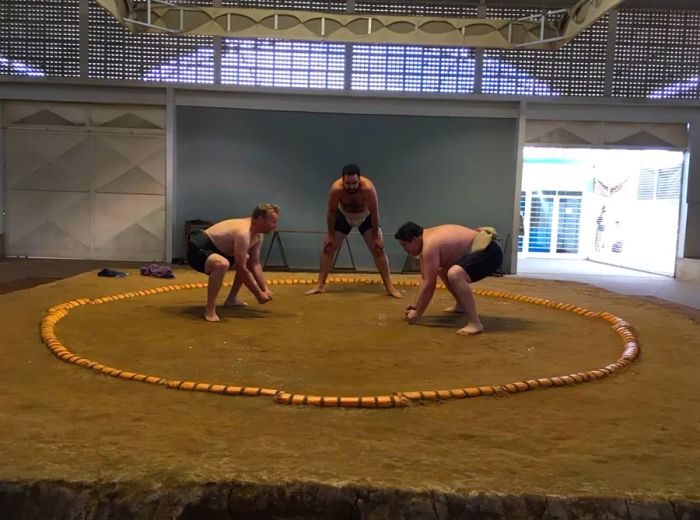 During a training session at the Mie Nishi gym, two competitors face off against each other.