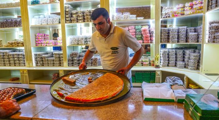 Locals flock to Aliahmed Sweets to purchase their halva and other traditional delicacies.