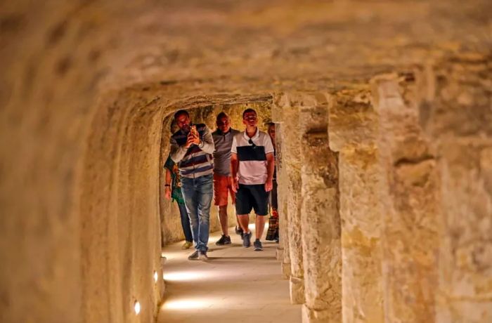 In March, tourists were photographed inside the newly reopened step pyramid of Djoser in Saqqara, following a multi-million dollar restoration project.