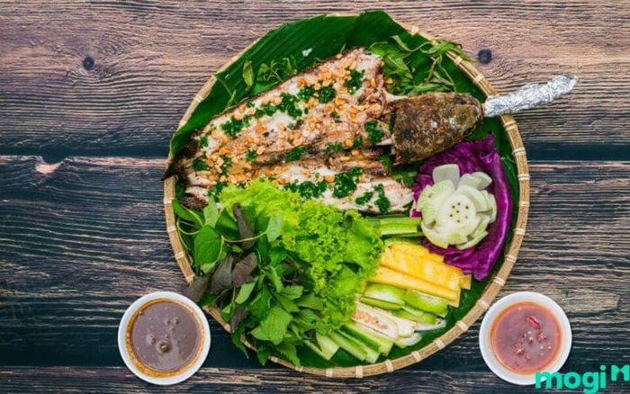 Địa điểm du lịch Đồng Tháp – Món cá lóc nướng cuốn lá sen non đặc trưng của miền Tây
