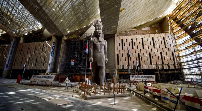 A massive statue of Ramses II is being installed inside the Grand Egyptian Museum in Cairo, as seen during its construction in 2019.