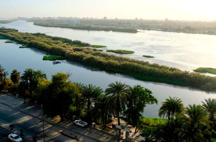 The Nile River flows through the southern suburb of Kozzika, located about 9 miles south of downtown Cairo, the capital of Egypt.