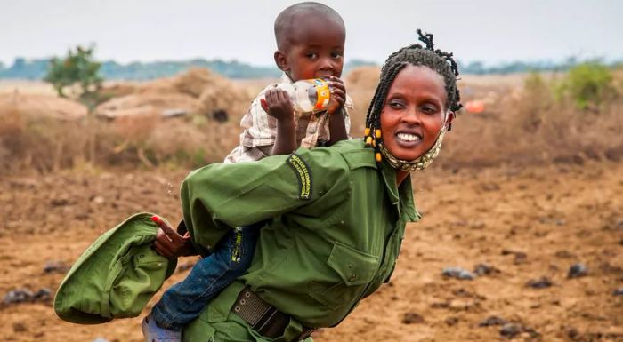 After spending four months in the field, Ruth Sekeita Losiaik, a member of Team Lioness supported by IFAW, was joyfully reunited with her two-year-old son, Bonham Shirim.