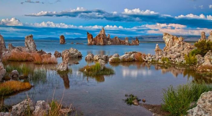 Tufa formations emerge from the waters of Mono Lake.