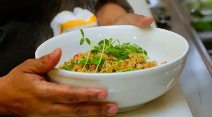 Dirty fried rice is the dish Holland shares at Family Meal, hosted at Alice Waters’ home.