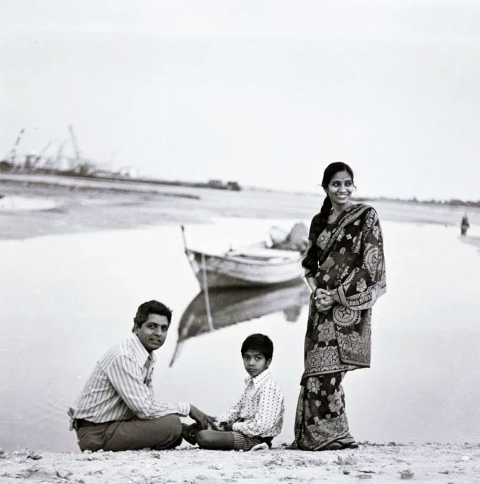 In the 1970s, Ramesh Shukla (left), his wife Taru, and their son Neel are photographed by the banks of Dubai Creek.