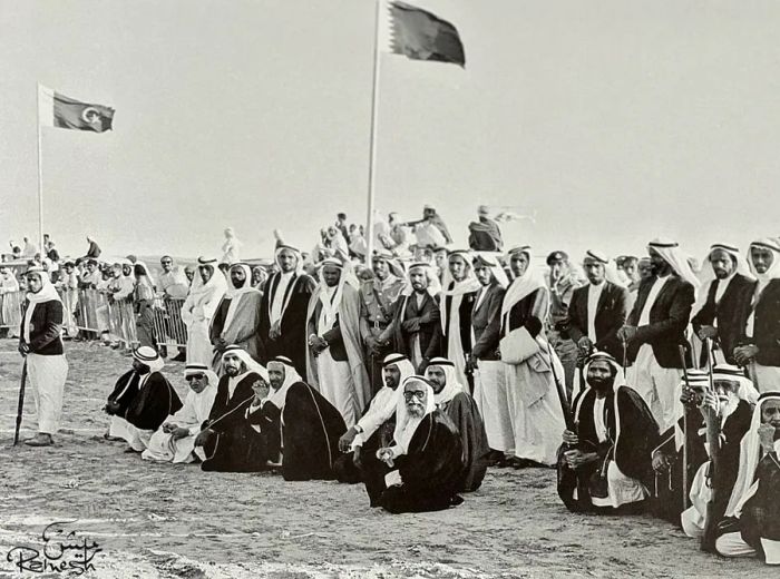 Sheikh Zayed and Sheikh Rashid observe a camel race in Sharjah, 1968.