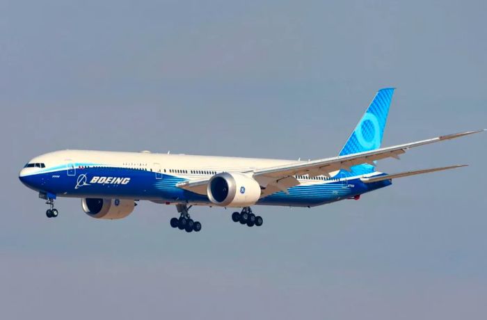 A Boeing 777-X aircraft takes to the skies at the Dubai Airshow.