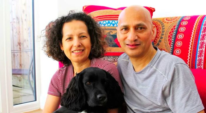 A recent photo of Feliciano and Sah alongside their dog, Ziggy.