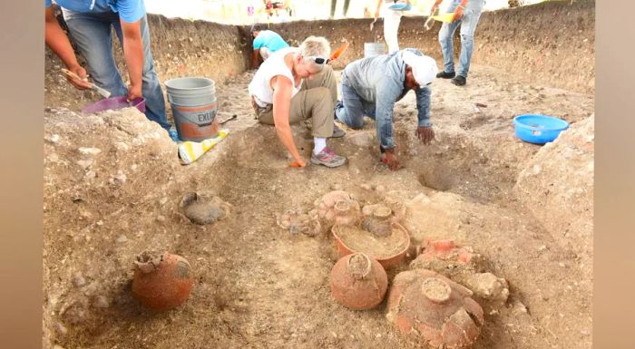 In addition to mapping Aguada Fénix from above, the team also dug into the site, uncovering ceramic vessels and other artifacts.