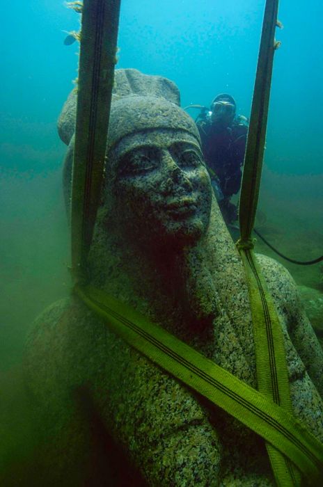 A massive statue of Hapy, crafted from pink granite and standing over five meters tall.