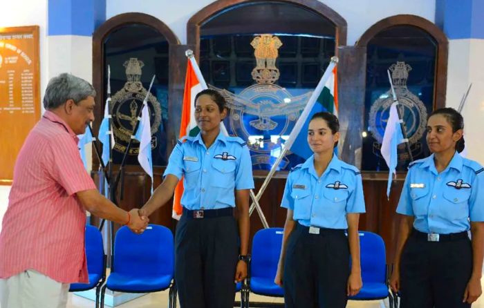 In 2016, Indian Defence Minister Manohar Parrikar praised the Indian Air Force’s first three female fighter pilots: Bhawana Kanth (L), Avani Chaturvedi (C), and Mohana Singh.