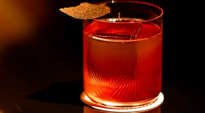 This cocktail, crafted at London’s Kwant bar, is called Heads and Tails.