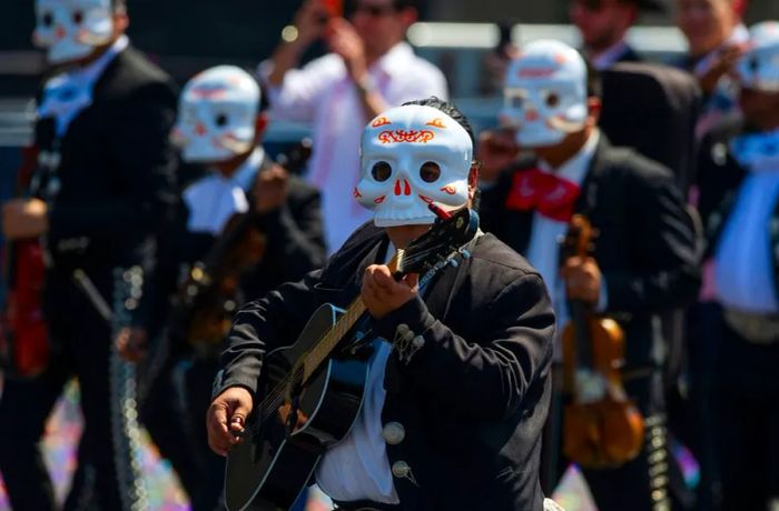 On October 31, 2021, Mariachi bands performed during a Day of the Dead parade in Mexico City.