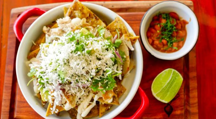 Chilaquiles repurpose leftover tortillas into a delicious dish.