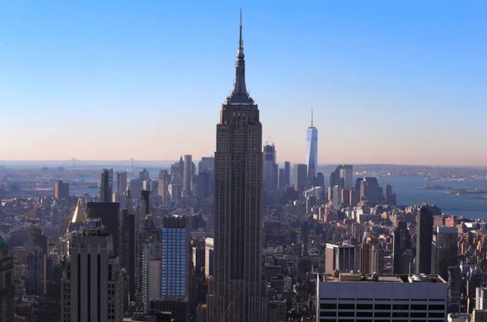 The Empire State Building towers over Midtown Manhattan.