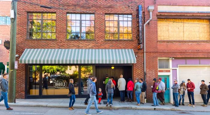 Every morning, locals in Asheville gather outside Button & Co. Bagels, eager to get their hands on fresh bagels.