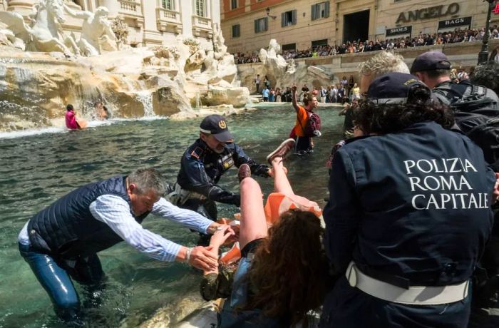 Activists from the Last Generation group gathered at the Trevi Fountain in Rome to stage their protest.