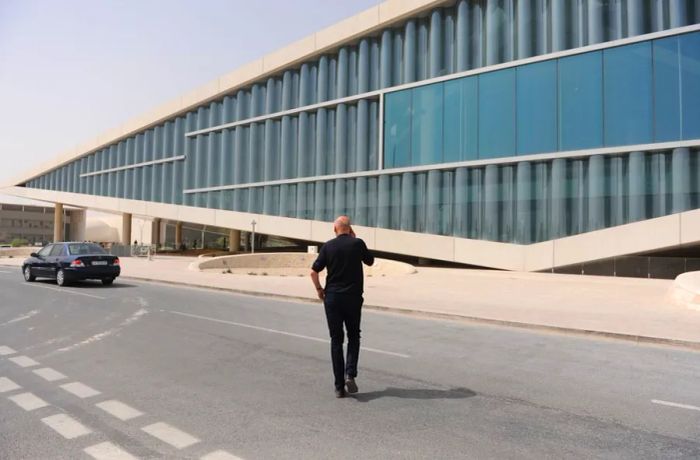 Koolhaas standing outside the Qatar National Library. 'Every building demands an incredible amount of work,' he said. 'I’m not saying this as a complaint, but it’s an immense amount of effort.'