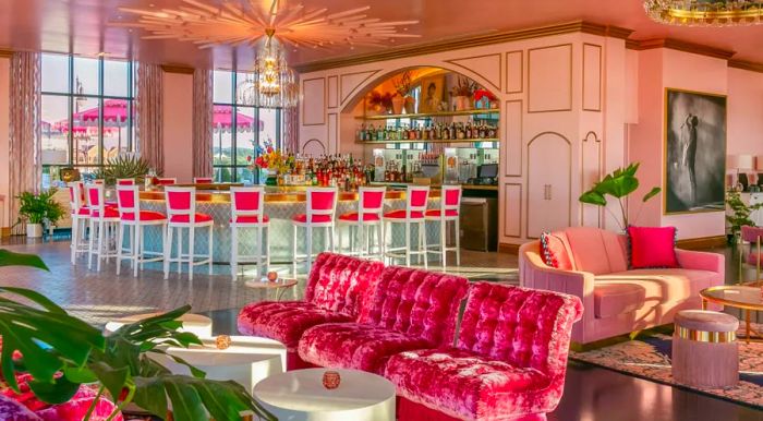 At White Limozeen in Nashville, pink walls, plush velvet seating, and a quirky wrap-around bar set the scene for an '80s-inspired Dolly vibe.