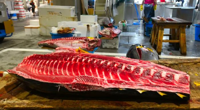 Fresh tuna displayed outside a fish brokerage shop at the new Toyosu fish market.