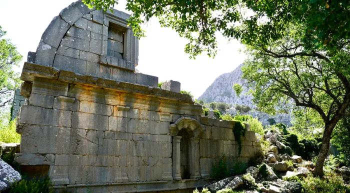 The remains of the gymnasium building reveal that it was once adorned with grand, decorative arches at its entrance.