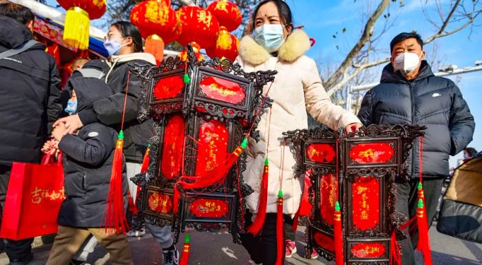 The lanterns represent the dispelling of darkness and the arrival of hope for the coming year.