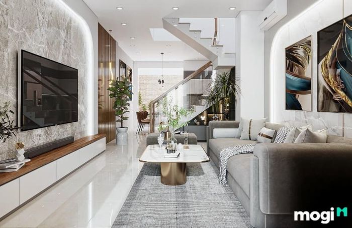 Các màu sắc như trắng, ghi, xám, nâu sẽ giúp phòng khách diện tích vừa trở nên hài hòa và dễ dàng kết hợp với nhiều phong cách thiết kế khác nhau.