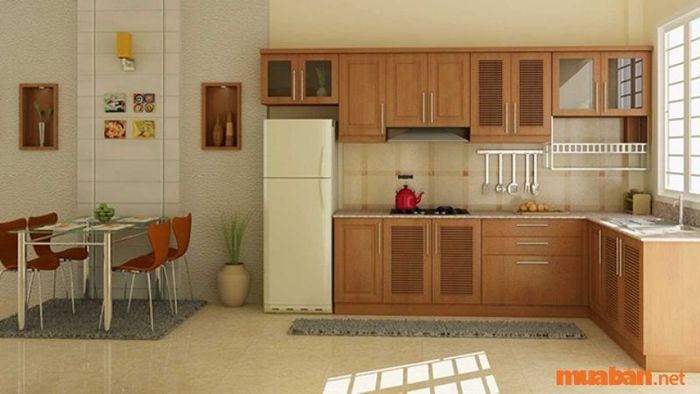Phòng bếp được trang trí với gam màu trắng kết hợp vân gỗ, tạo nên không gian ấm áp, lý tưởng cho những gia chủ yêu thích sự tối giản và thanh lịch.