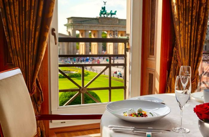 From its elegant dining room, Lorenz Adlon Esszimmer offers diners a breathtaking view of the Brandenburg Gate, making it as much a visual feast as it is a culinary one.