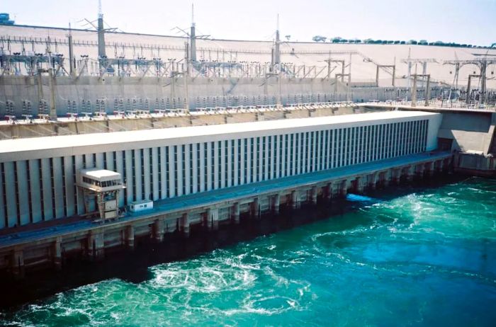 The Aswan High Dam, completed in 1970, plays a crucial role in generating hydroelectric power for Egypt and expanding the country’s agricultural land.