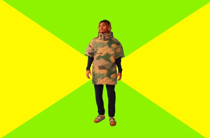 Man wearing camo print puffy poncho