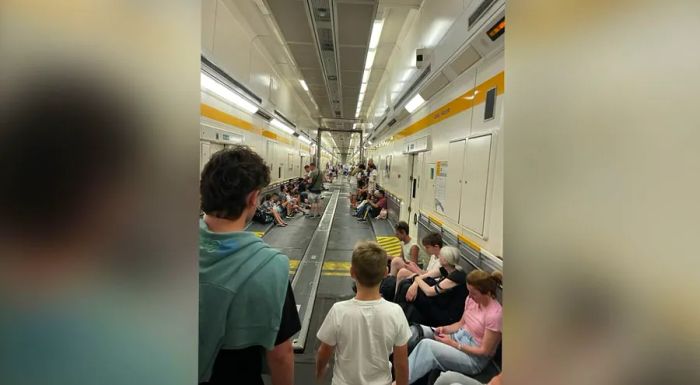 Passengers squeezed into a bus compartment on the Eurotunnel.