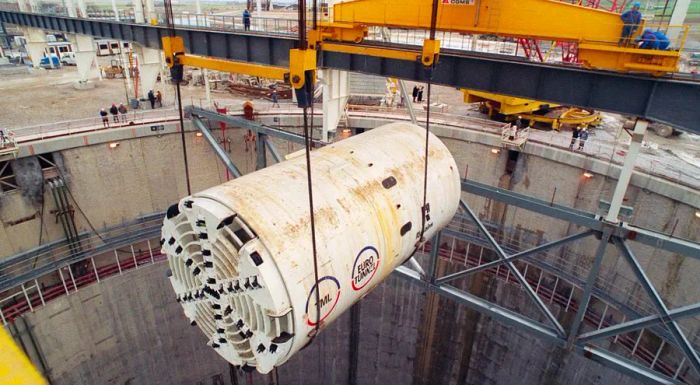 In 1988, one of the tunnel’s giant boring machines hangs over the entrance to the tunnel on the French side of the Channel.