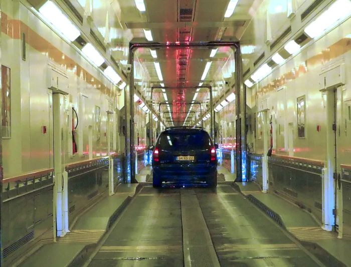 Eurotunnel trains carry cars and their drivers through the tunnel.