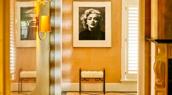 The bungalow is adorned with iconic black-and-white photographs of Marilyn Monroe.