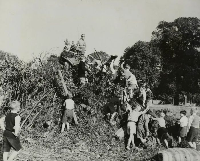 A 1955 photograph showing children at a school in Surrey, England, preparing for the Guy Fawkes Night bonfire.