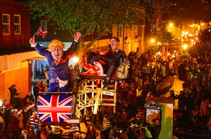 In 2019, effigies of former UK Prime Minister Boris Johnson and Conservative politician Jacob Rees-Mogg were paraded through the streets of Lewes as part of the town’s traditional Bonfire Night celebrations.