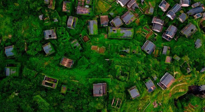 The abandoned village looks even more mystical when enveloped in fog.