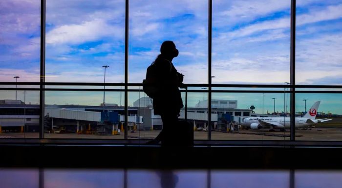 A traveler at Sydney Airport on June 23, 2021.