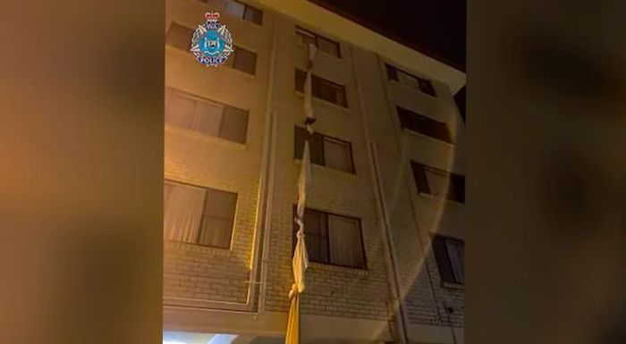 A 39-year-old man was arrested and charged after fleeing his hotel room, defying orders to return to Queensland.