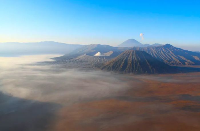 Indonesia's iconic Mount Bromo, as seen in this striking image in the foreground.